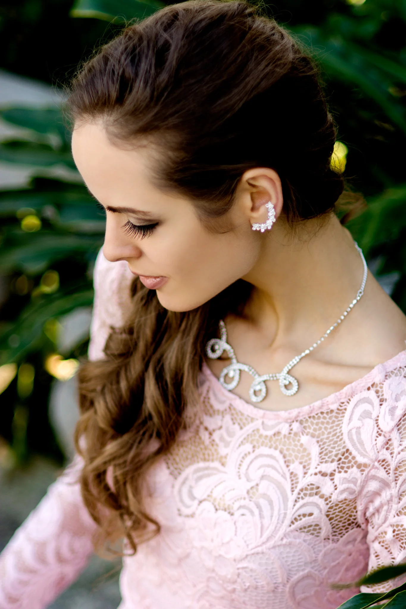 A serene vintage profile shot taken by Carlie Chew Photography in the gardens of historic St. Petersburg, FL