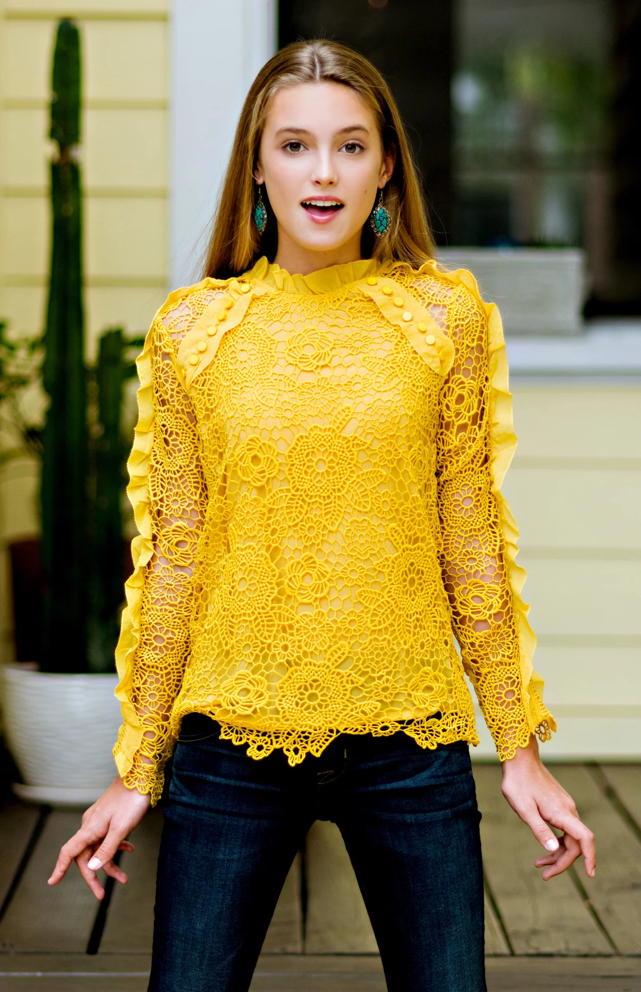 Adorable model poses in clothing from Marhsall's and Paige Denim, for florida photographer Carlie Chew