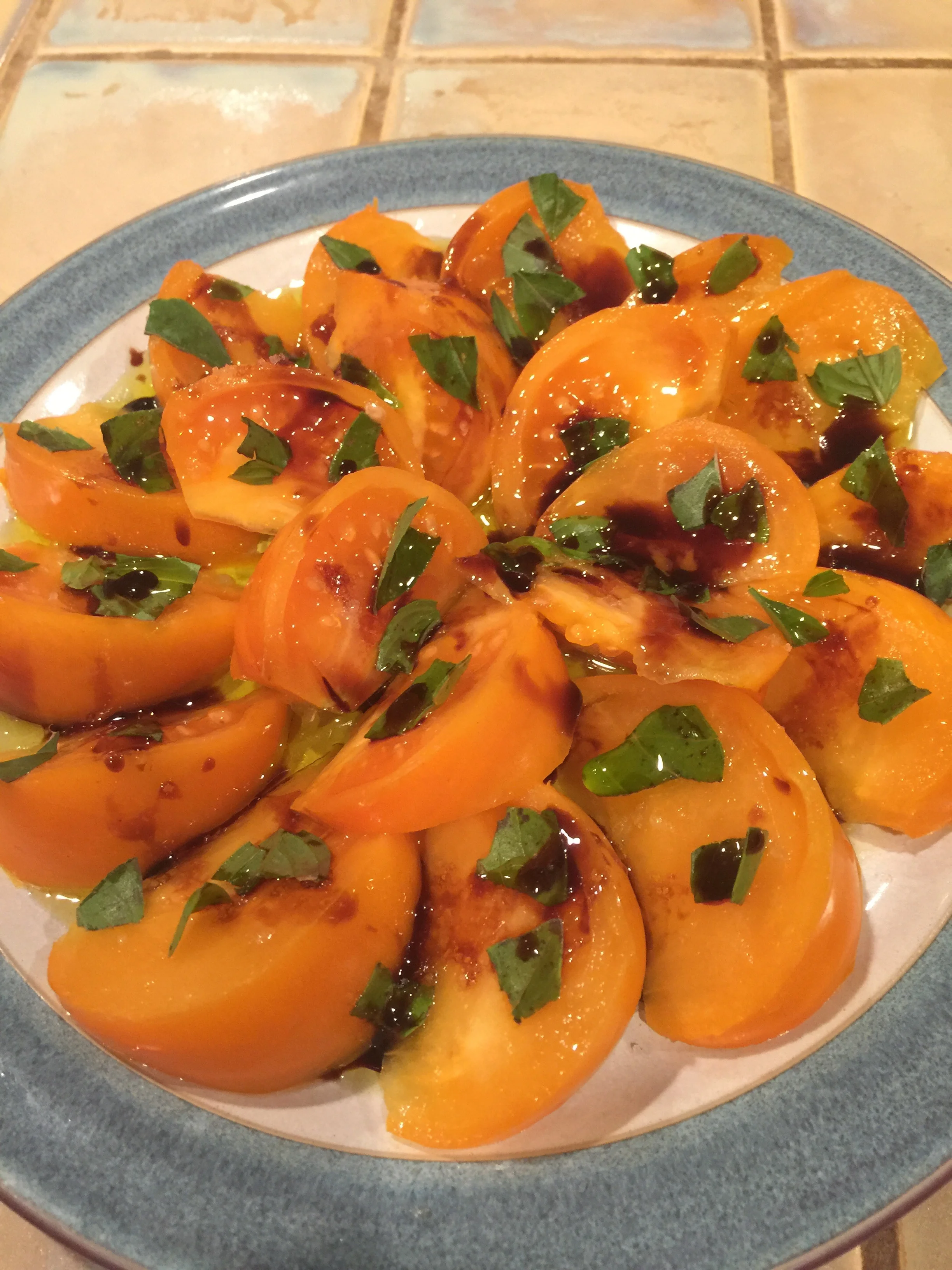 Sweet yellow tomatoes with basil, sea salt, olive oil and balsamic vinegar