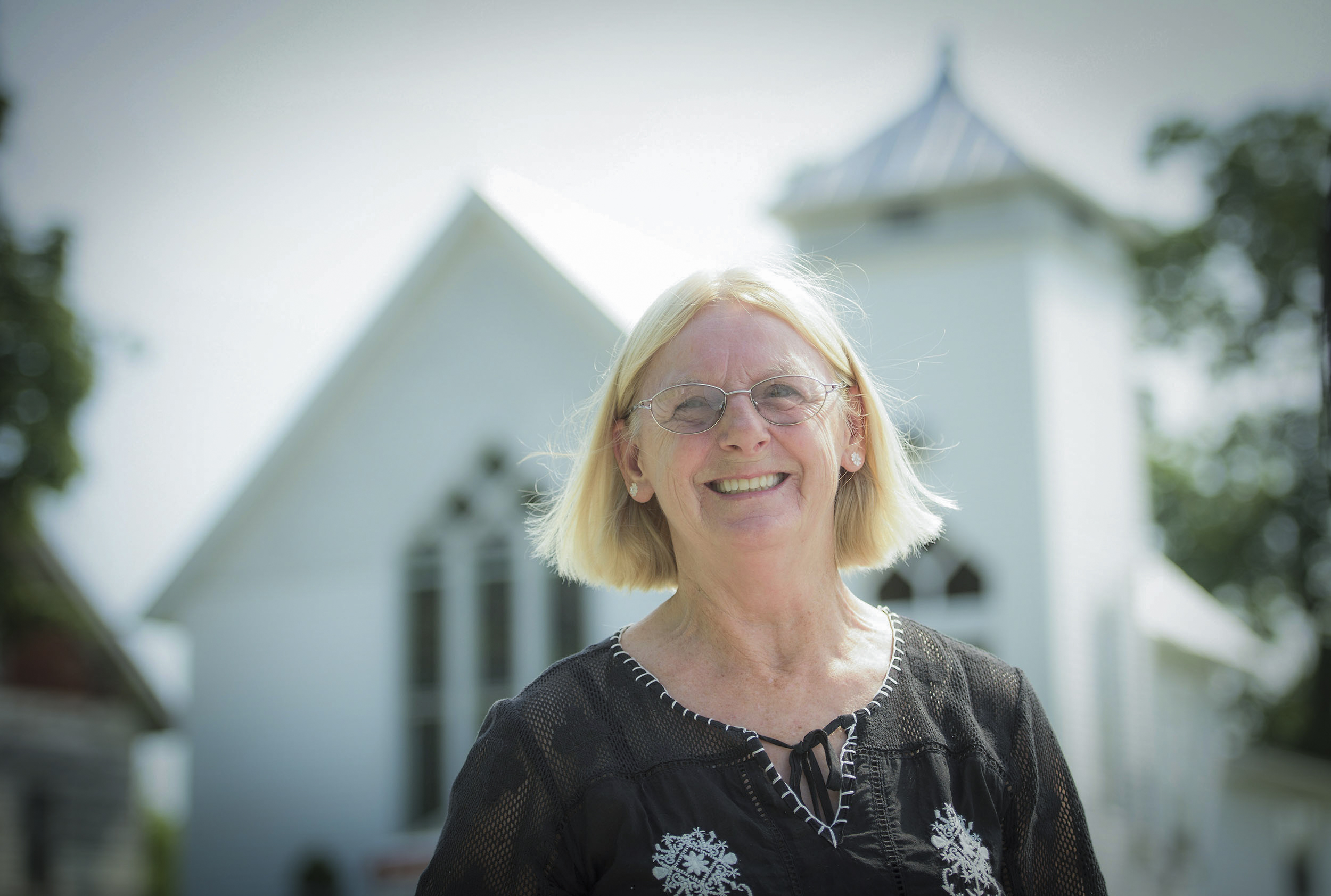 Mary Withers, a life-long resident of Boyd, Kentucky in front of the historic Boyd Methodist Church. (Photo by Jack Gruber)