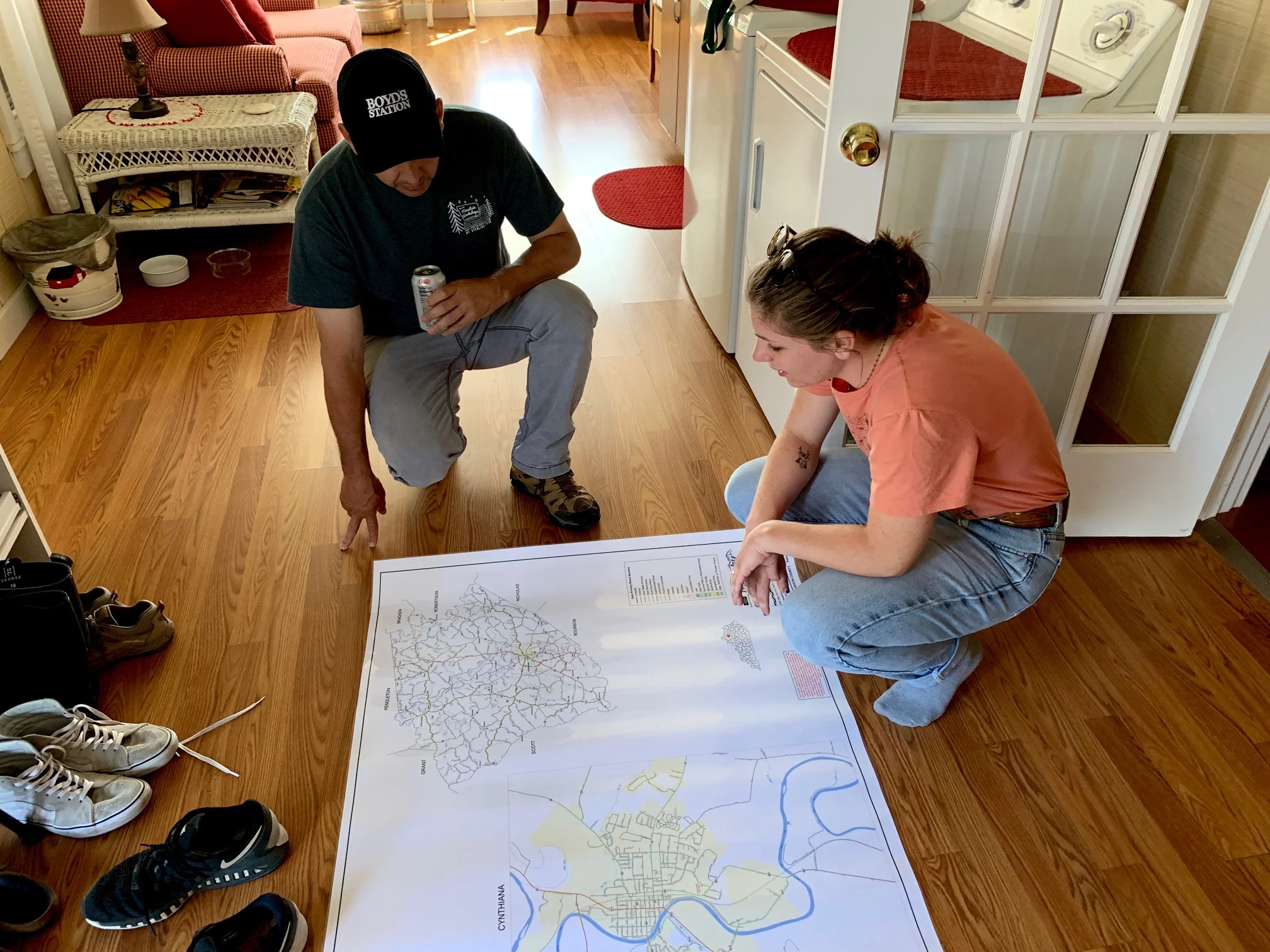 Jack Gruber from Boyd’s Station offering Harrison County directions and advice to Ohio University’s Carolyn Rogers at the start of Dawn to Dusk. Photo by Jenny Jones
