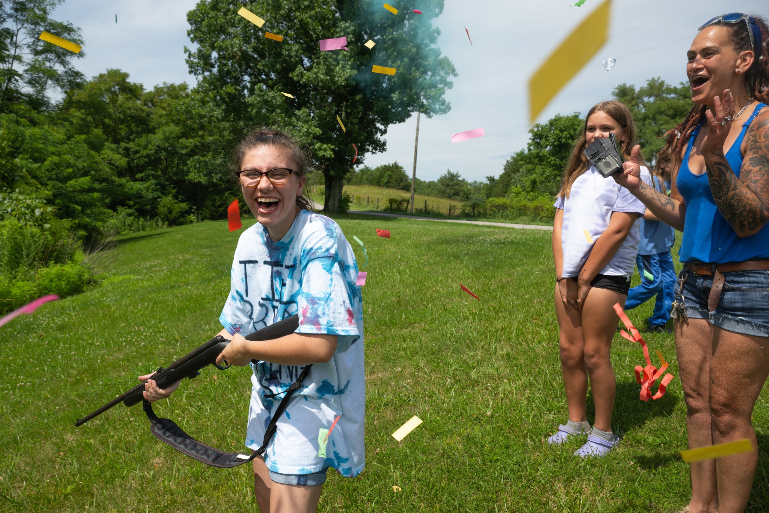  7/8/23 -- Cordova, Kentucky —  Amanda Aguilar, left, smiles after learning the sex of her baby at her gender reveal party near Cordova, KY on July 8, 2023. 