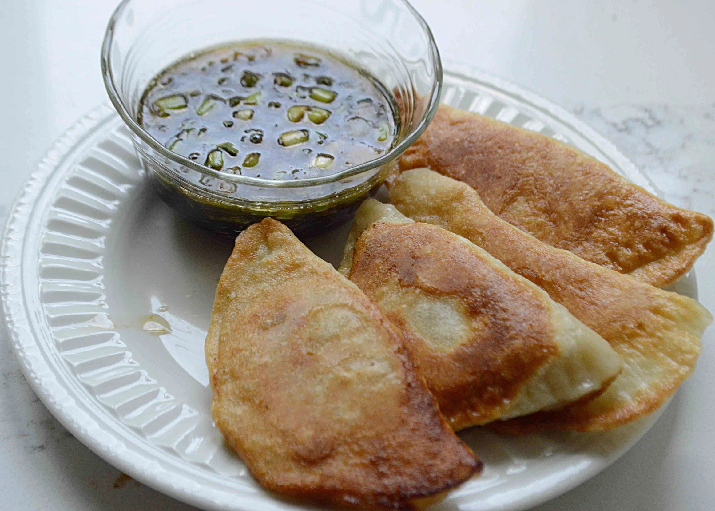 Chicken Potstickers with Spicy Soy Dipping Sauce — Unwritten Recipes