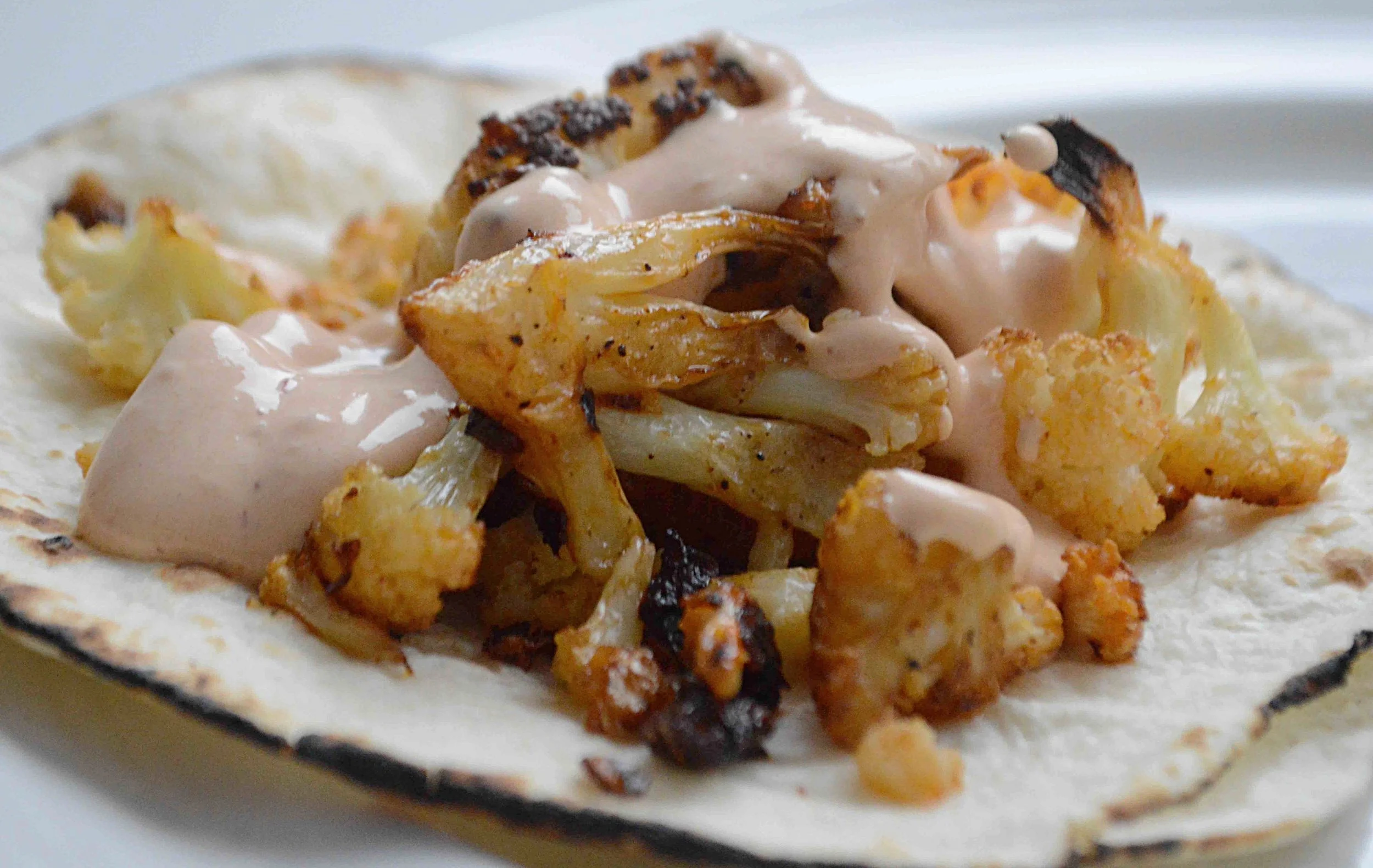 Spicy Roasted Cauliflower Tacos with Chipotle Yogurt Sauce — Unwritten