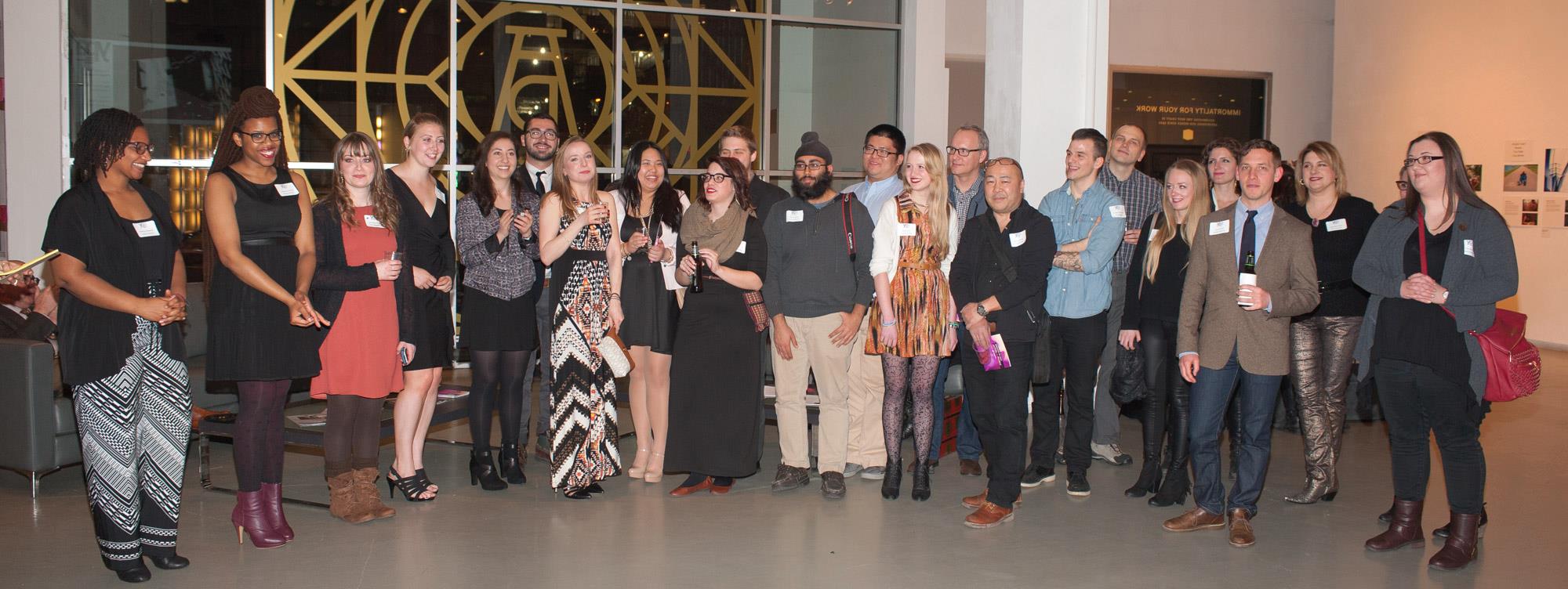 Standing with YPA Mentees and Mentors from across the U.S., Canada, and England that were able to be at the New York gallery. (Photo from Young Photographers Alliance Facebook page , photo by Lawrence Lucier)
