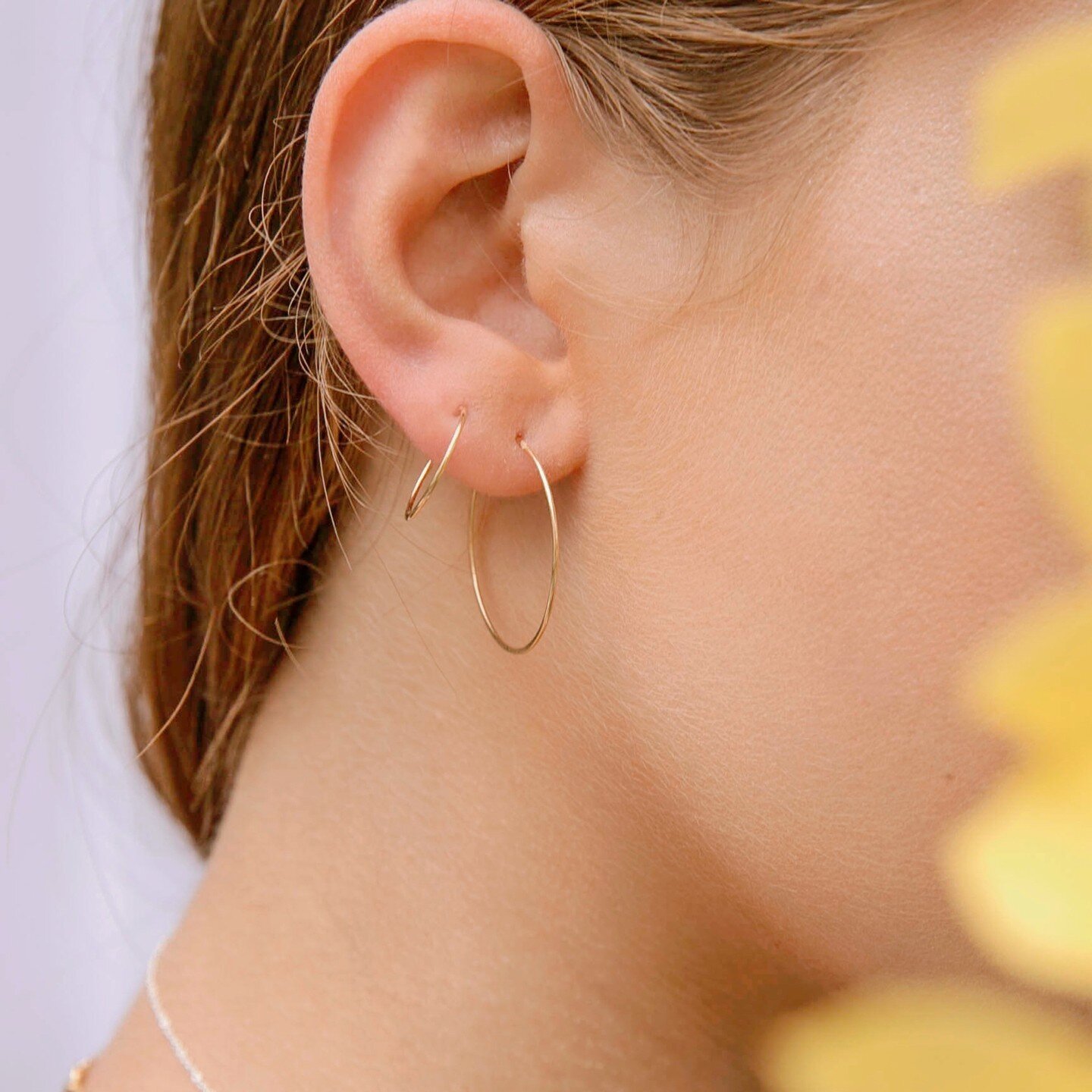 Two minimalistic hoops, one eye-catching look. 🤩⁠
⁠
Jewelry doesn't have to be big and heavy to garner attention. ⁠
⁠
Stop by the studio today or visit our online store to see all the sweet looks available.