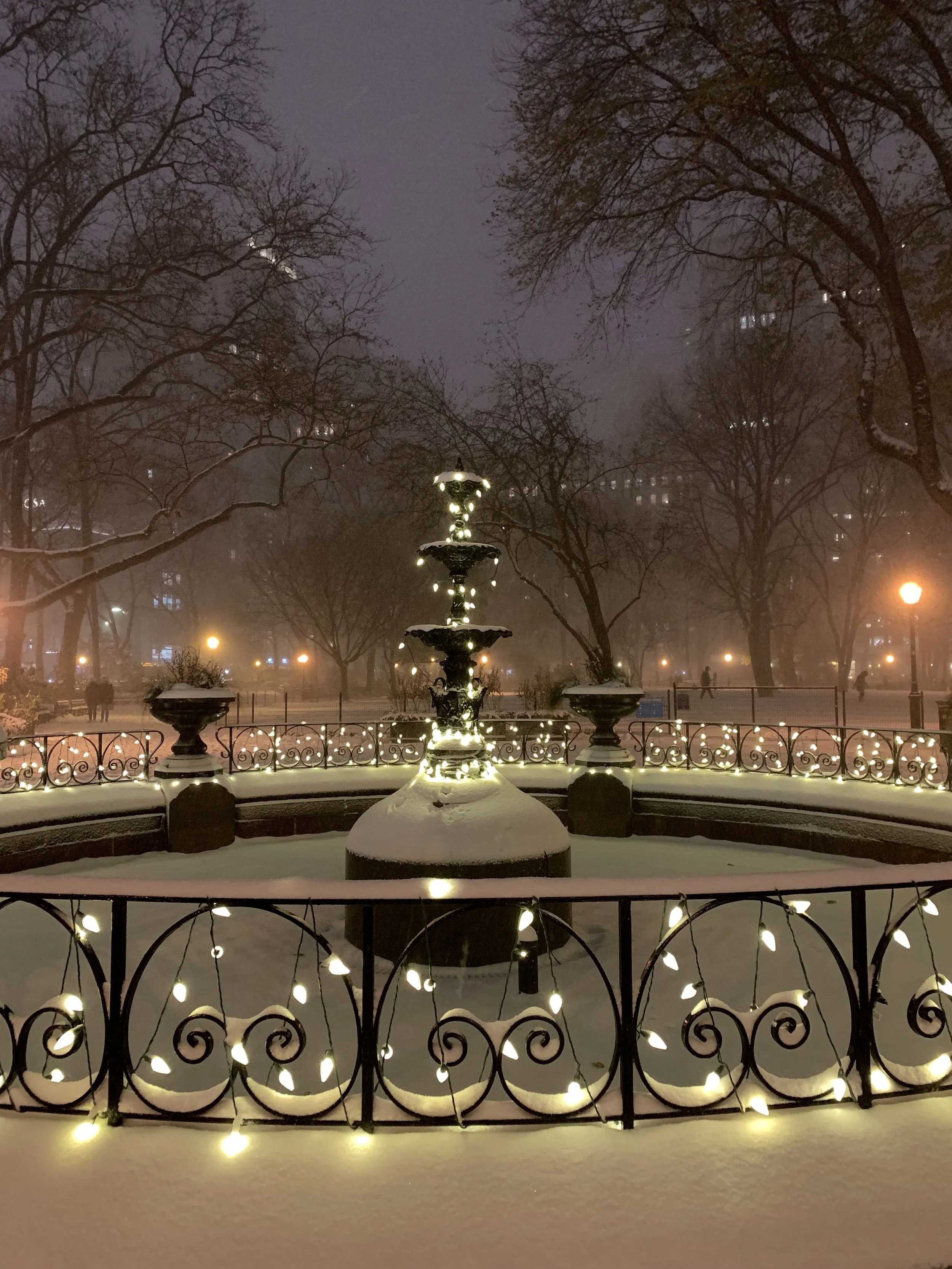 Hearts of Snow: Under the falling snow, love left its mark—hearts shining softly in Madison Square Park.