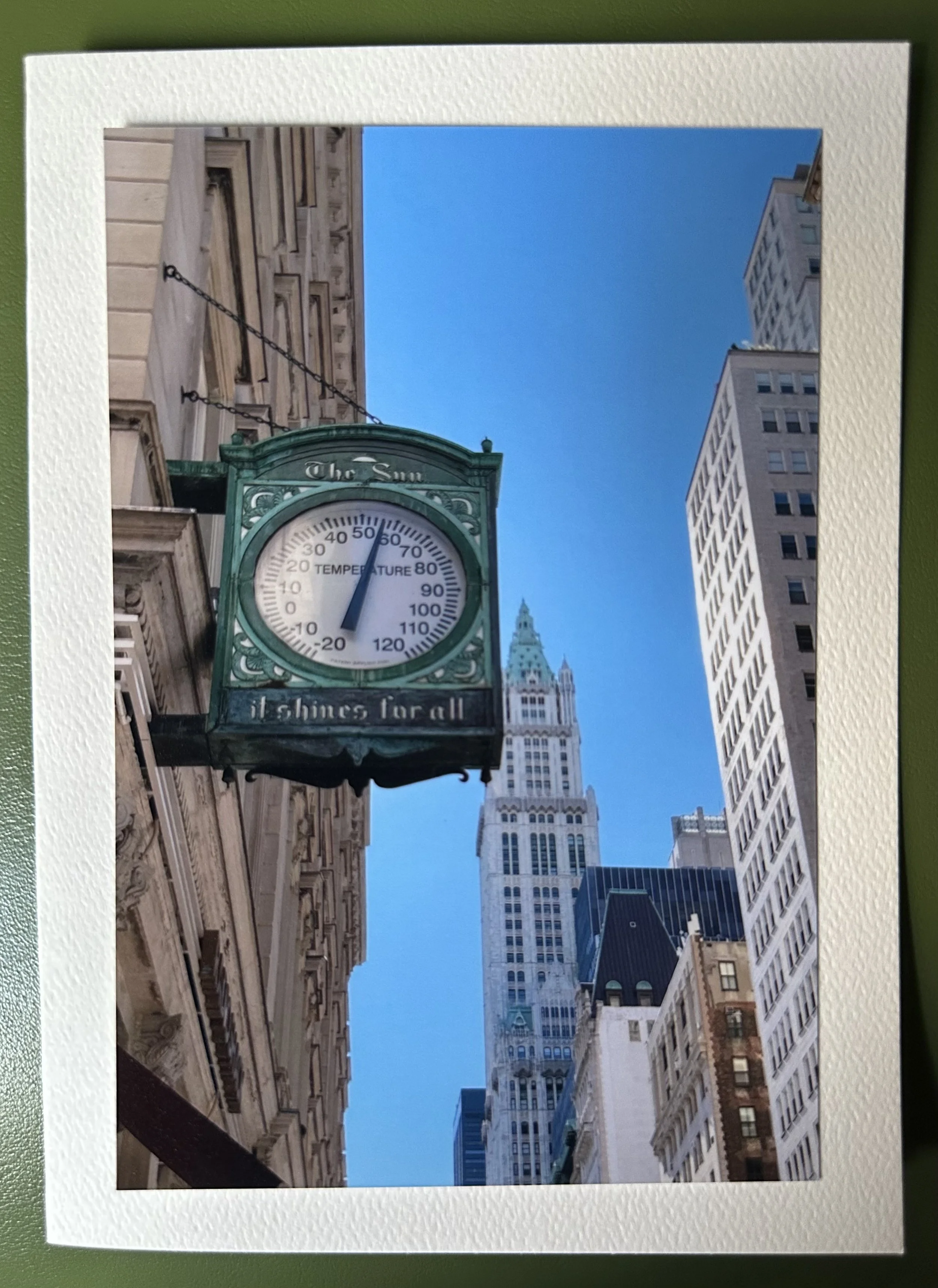 Sun Clock and Woolworth Building.jpeg
