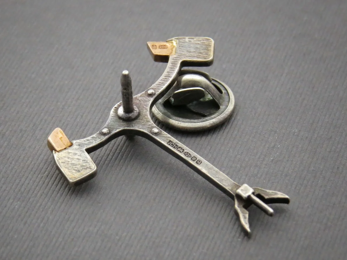 Silver and Gold pin back.jpeg