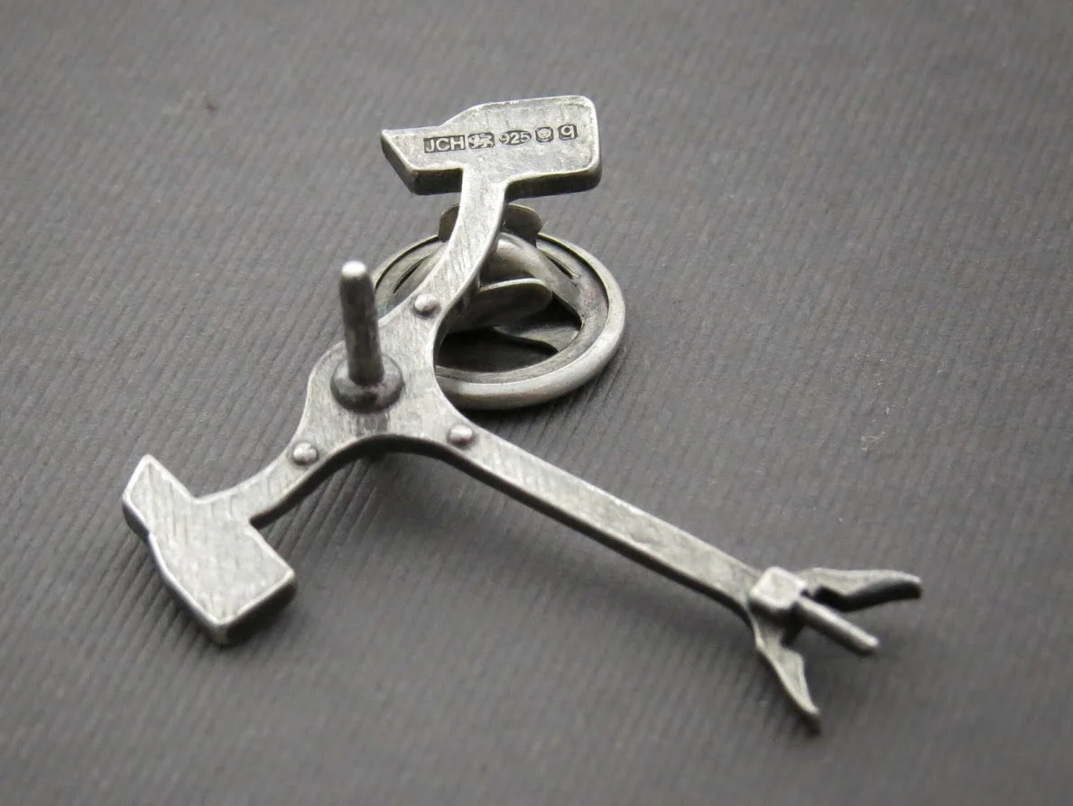 Silver pin back.jpeg