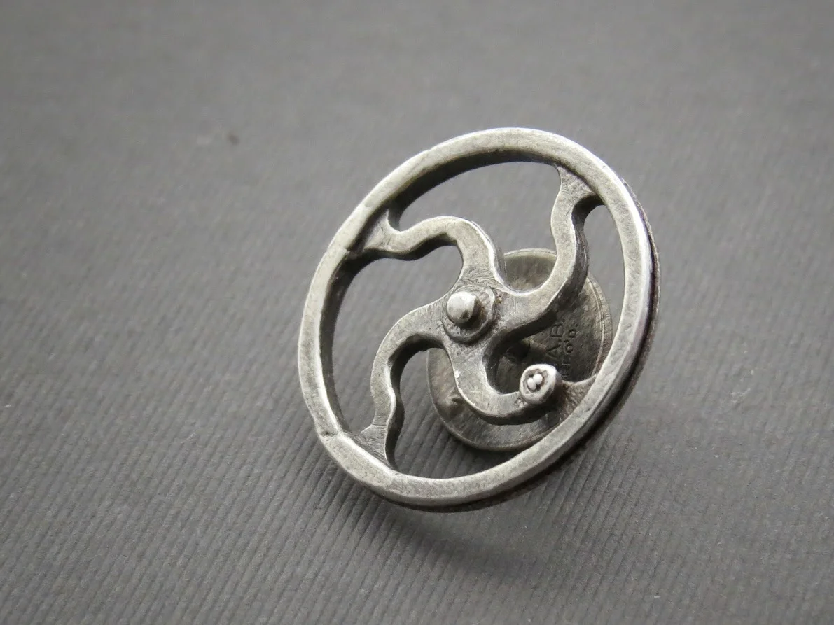 Silver topping tool pin.jpeg