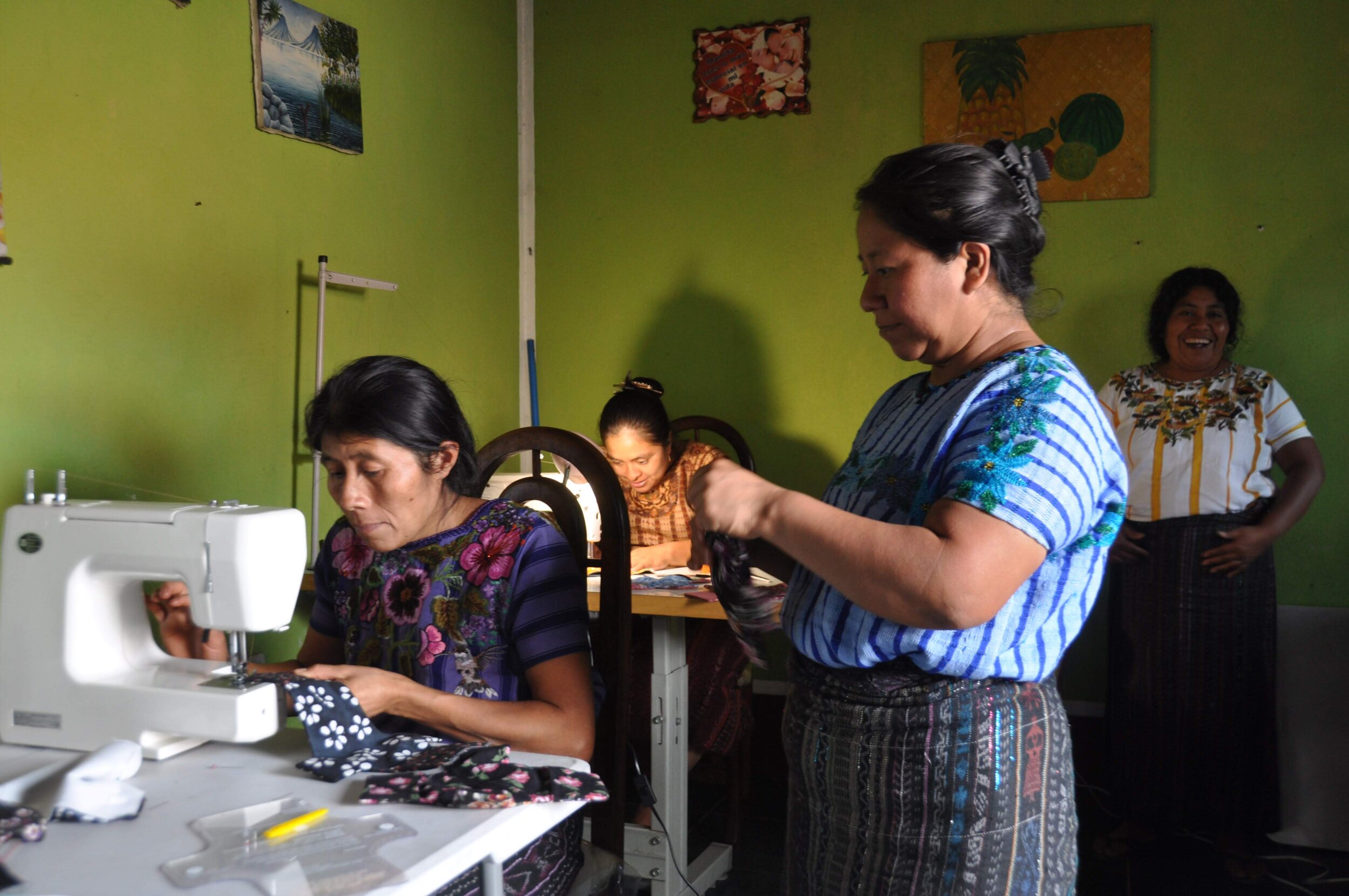  Women receiving training on sewing 