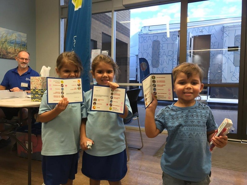 Delighted graduates of the Healthy Kids Bus Stop with their stamped bus passes