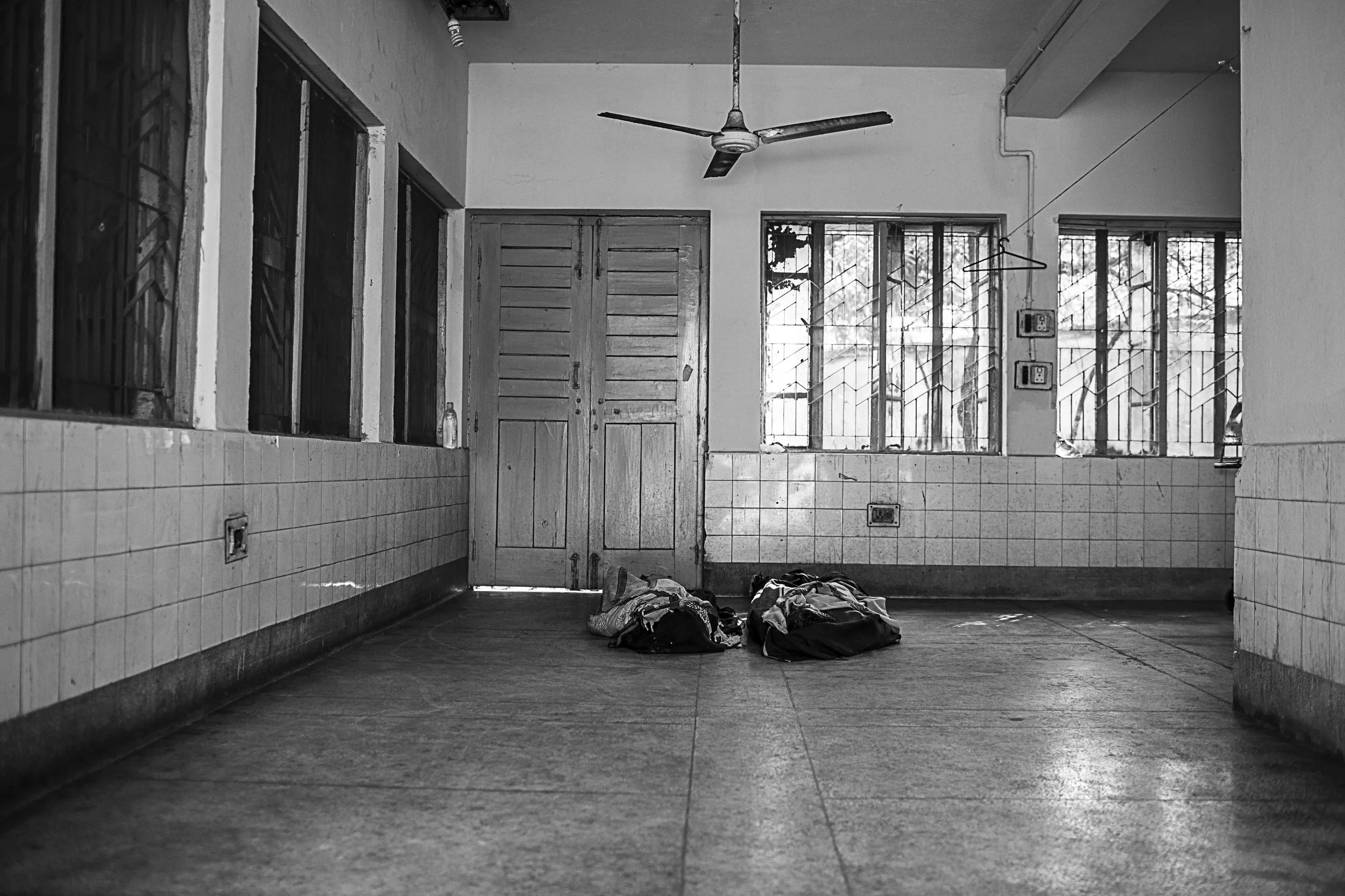 The body of Farid Mia lays next to an unidentified body. Farid fell victim to a Molotov cocktail, which hit a bus in the capital. He leaves behind a son and wife