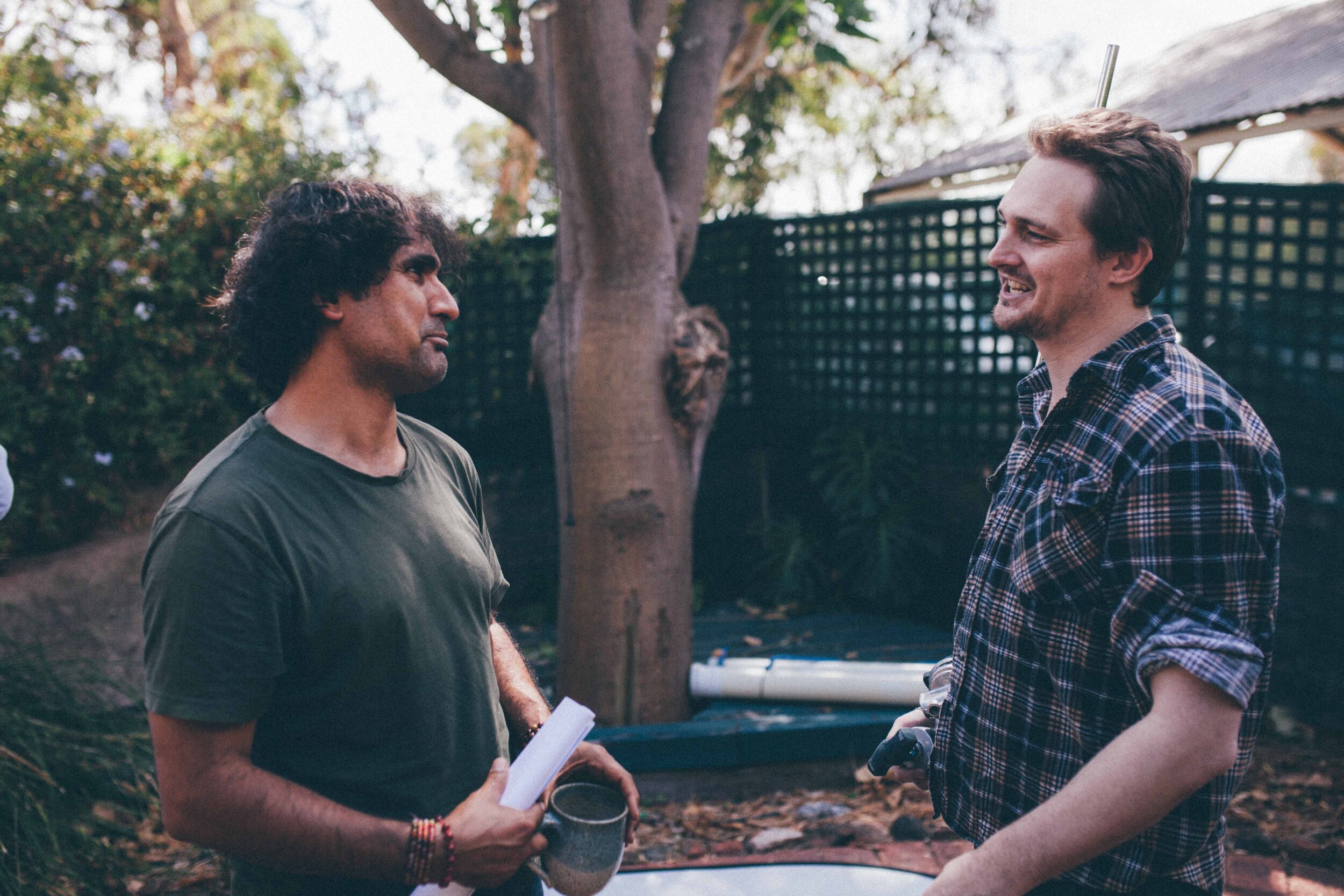  Arad and Director, Daniel Pitcher have a moment during filming. 