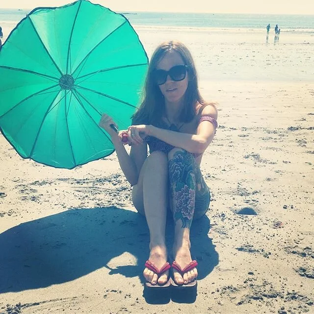 Turquoise parasol and wooden Geta clogs. Small pleasures!