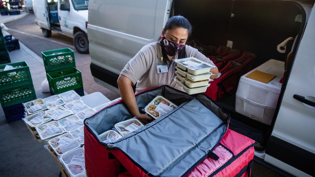 Brenda packing meals.jpg