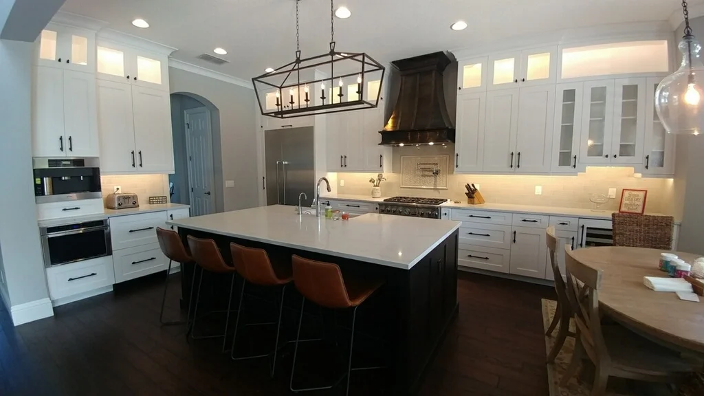 LED ribbon lighting in the upper cabinets and under-counter task lighting. New island light and recess lighting.
