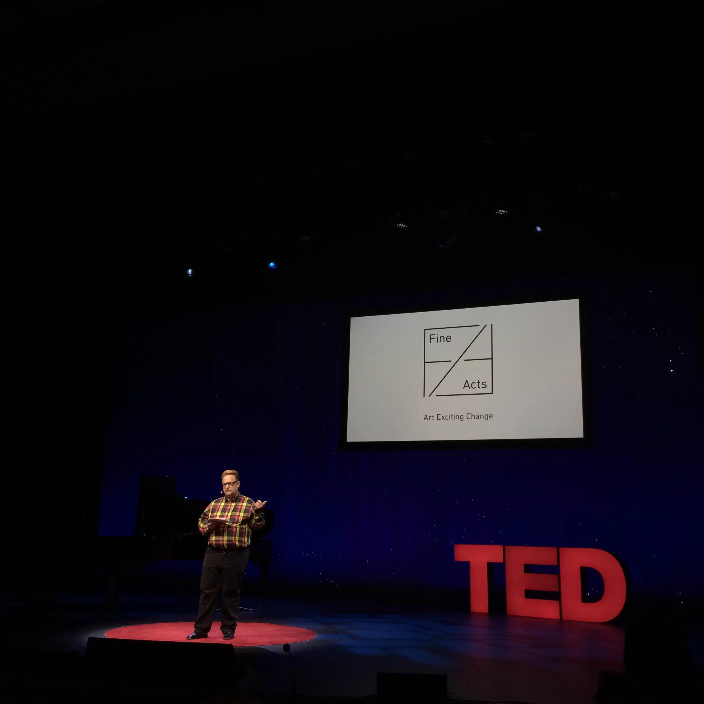 Tom Rielly, TED Fellows Director, talks about the initiative on stage.