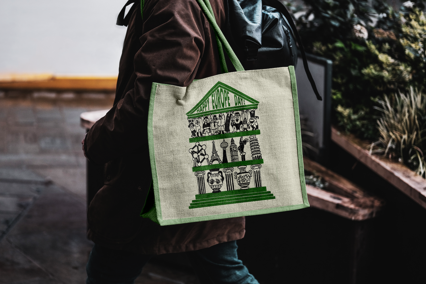 Free Eco Bag Carrying by Man Mockup.png