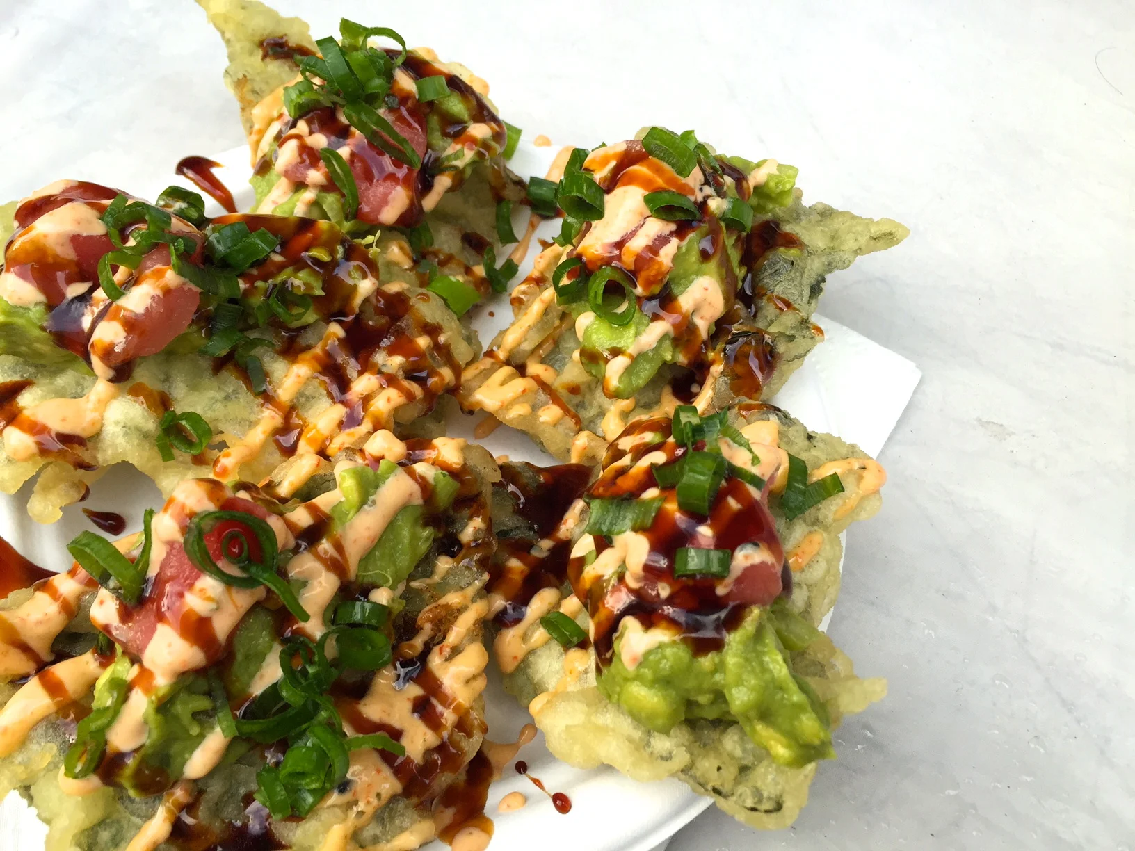 The killer dish at the Otsuji Farms stand-' Crispy Nori with Poke Tuna + Avocado+Scallions+Spicy Mayo.