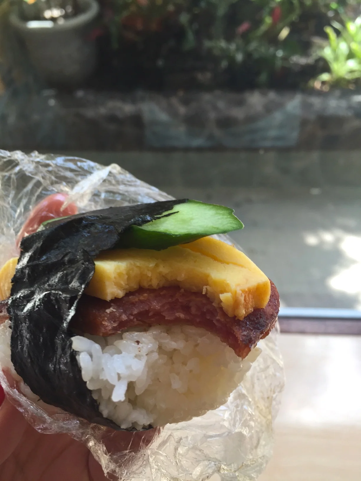 The key is the rice. Then you add your layers of spam, and other goodies. The combinations are endless! 