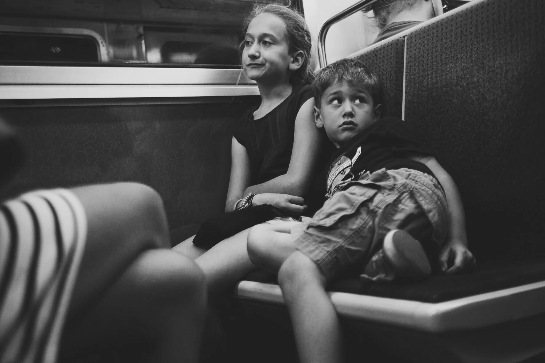 I've always loved riding the metro. Even in LA where the metro system isn't all that important for people are not all that dependent on it, but I'd take the train down to Union Station and back just for the sake of people watching. Like this charming child here, this was the one moment where he wasn't picking his butt. Such a lovely sight that was. 