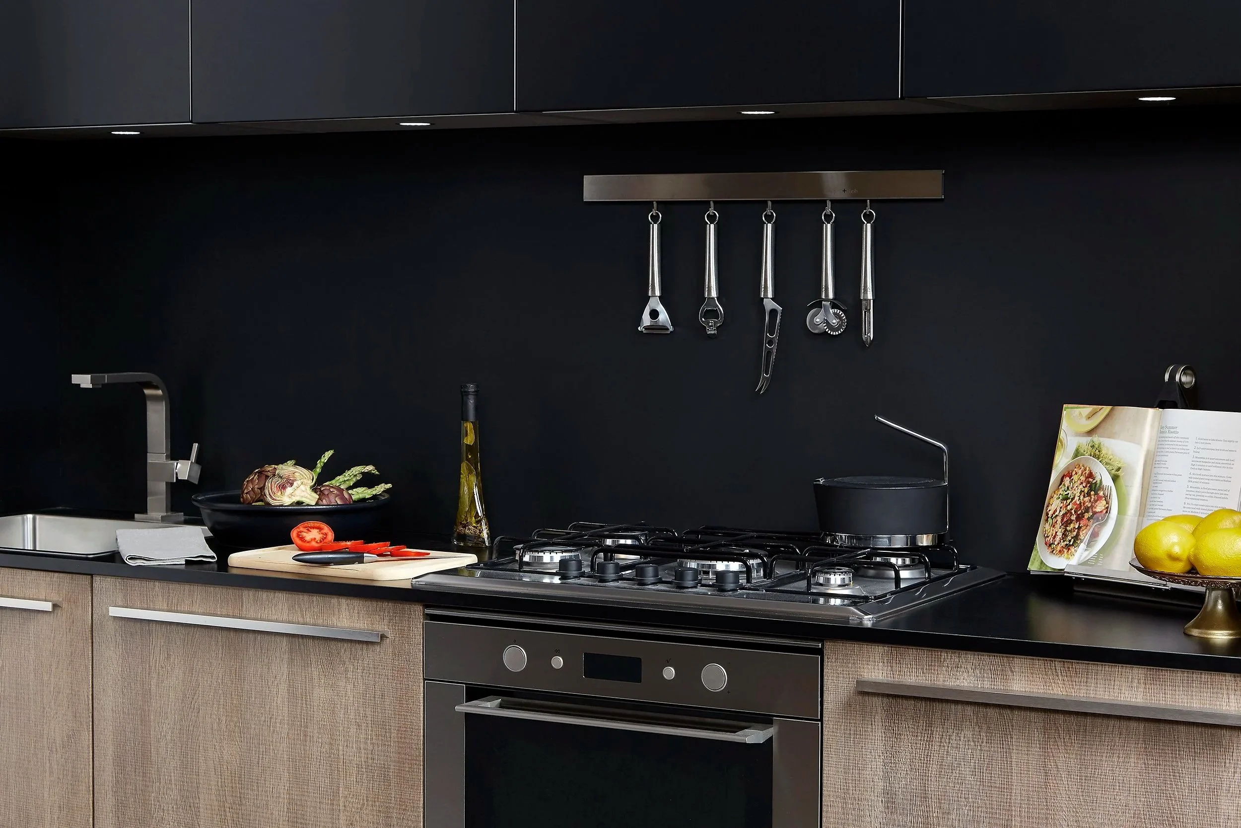 Trevisana showroom in Toronto featuring a curated, personalized kitchen with custom storage solutions, high-quality Italian-made materials, and precise craftsmanship blending tradition and modern innovation.