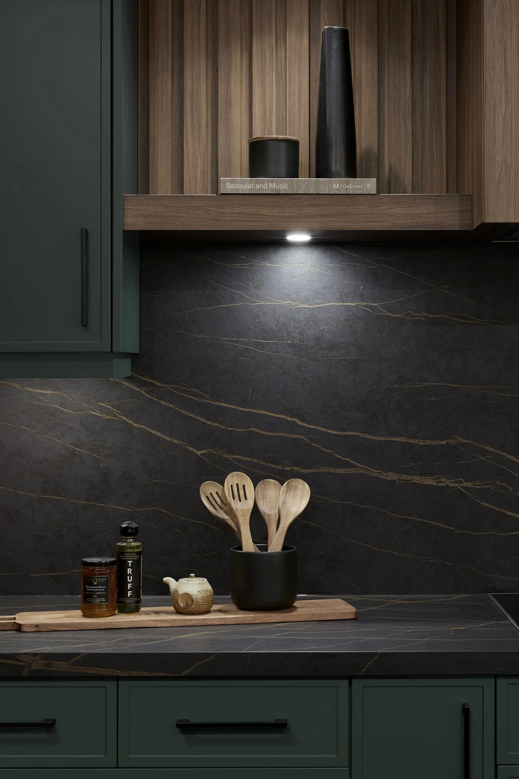 Treasure Hill Decor Studio showroom displaying custom kitchens with modern cabinetry, quartz countertops, premium finishes, integrated appliances, and styled details showcasing quality and craftsmanship.