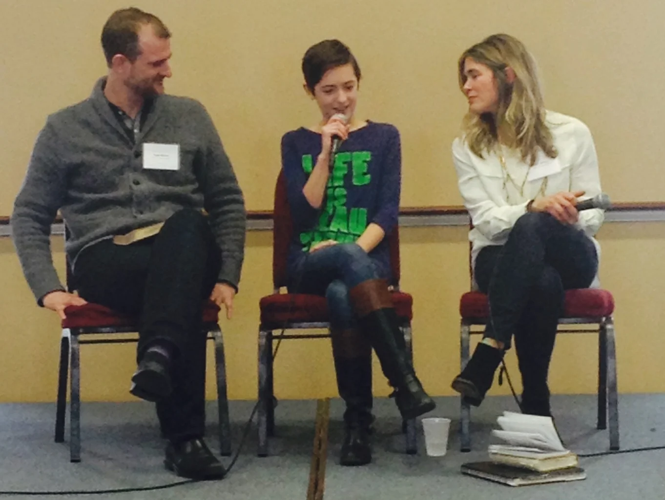Pastor Todd Wilson with one of his daughters and his wife, Katie (right).