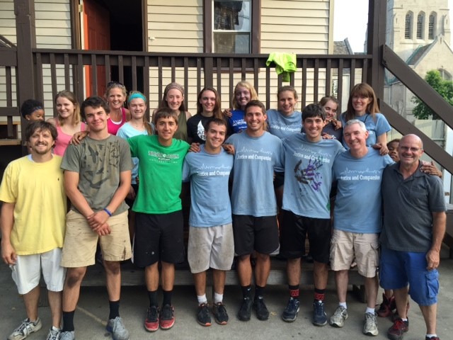 The Justice & Compassion team, with Daniel Bair (far left, yellow T-shirt)