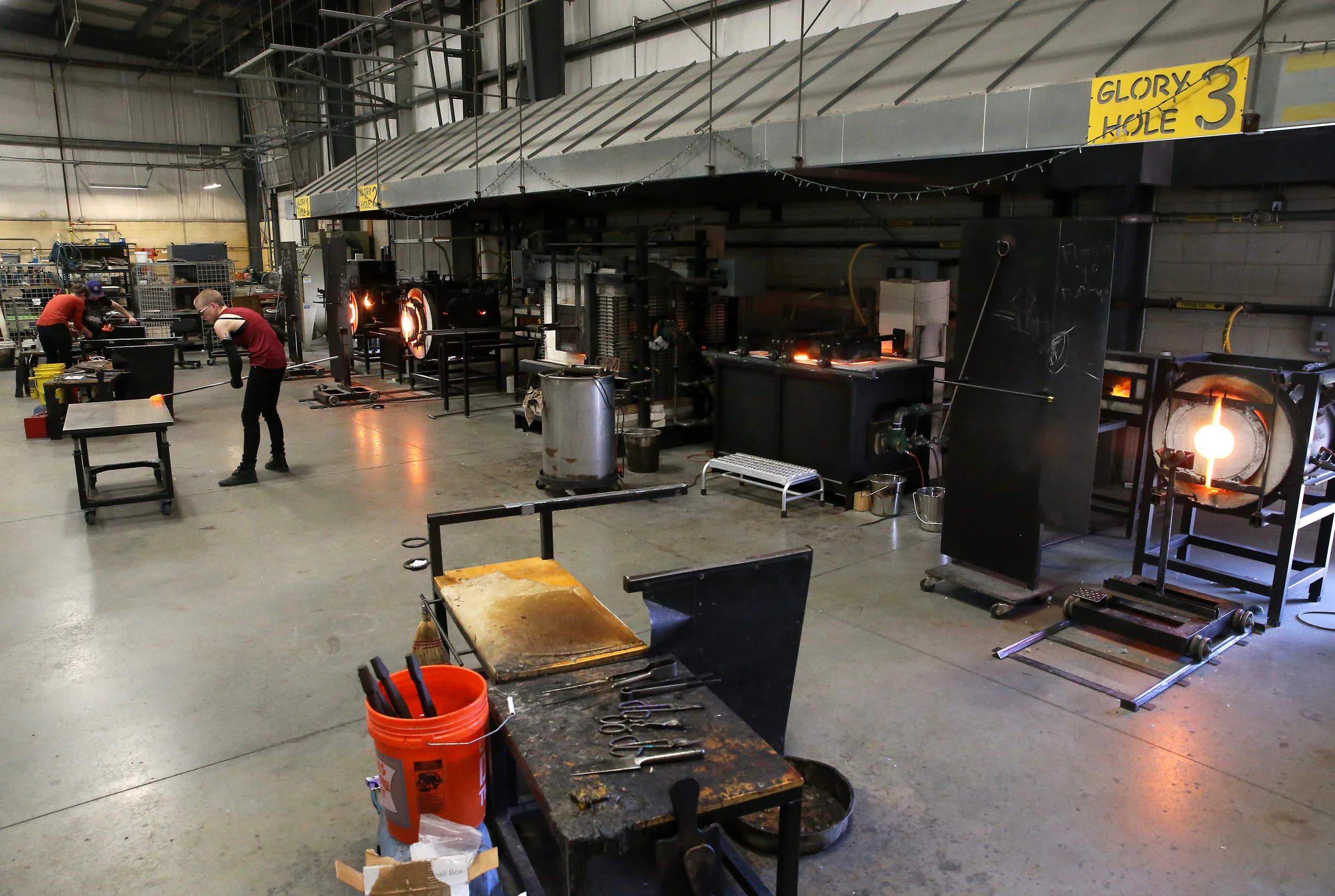 The hot shop is just one of four glass studio areas housed in the Paul J. Stankard Studio Lab; the studio also includes a flame shop, kiln shop, and cold shop covering all areas of studio glass.