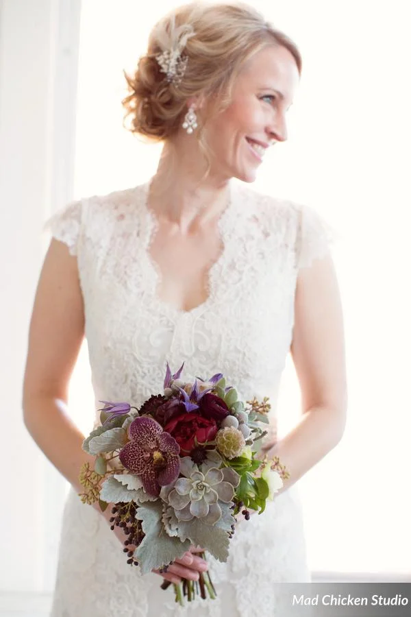 Speckled vanda orchids from Holland, black berry privet, amnesia roses, mercury glass, succulents, lush garnet peonies: these are a few of our favorite things. 