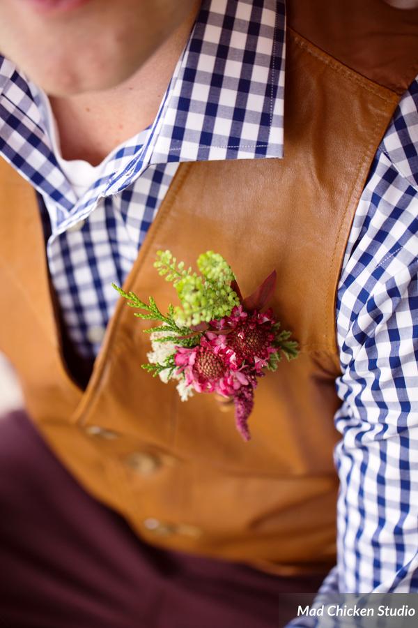 Contributing Vendors: On-couple styling/all floral and decor : Saffron & Grey Photography: Mad Chicken Studio Makeup: Derick Cich Makeup Artistry Hair: Sara Kringle of Vain Salon Venue: Brule River Barn Baked Goods: Madeline Island Bakery