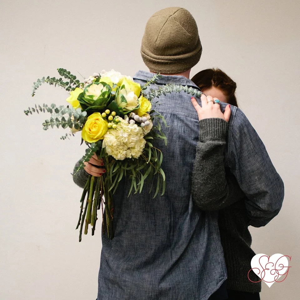 K&T’s love is totally natural, sassy & bright -- Featuring hydrangea, along with hypericum berry, ornamental kale, kochia, surrounded by eucalyptus.