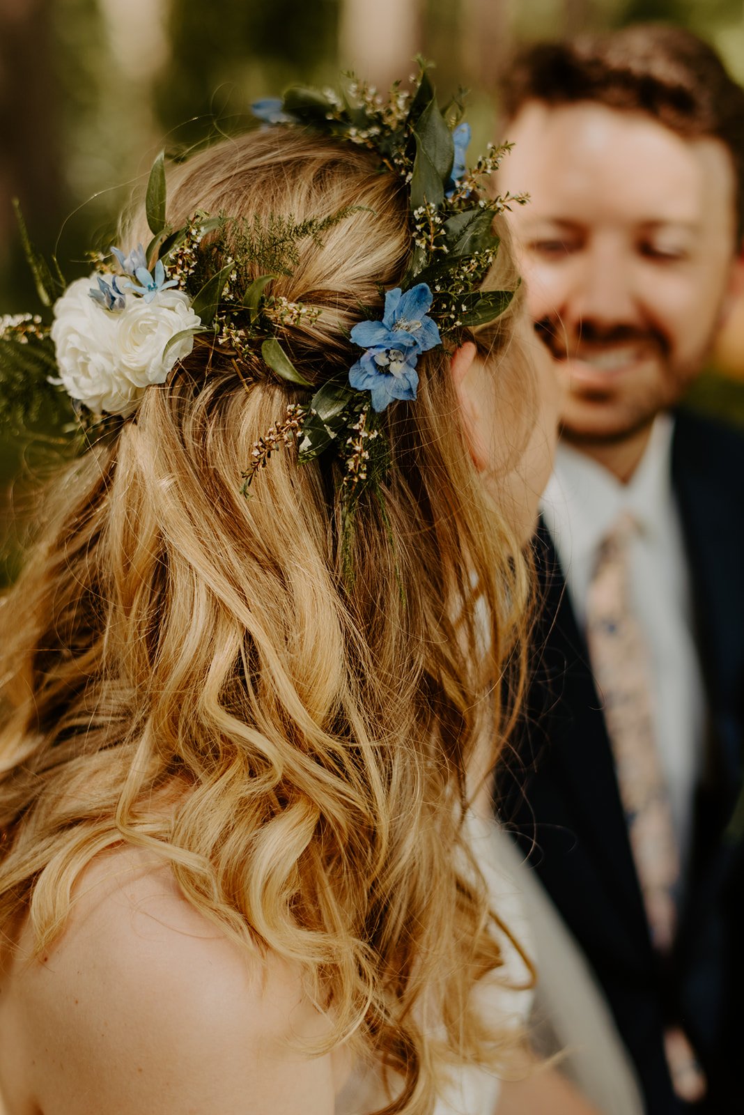 Iris' hair flowers were made up of a greenery and floral crown with a comb to sit at the back.