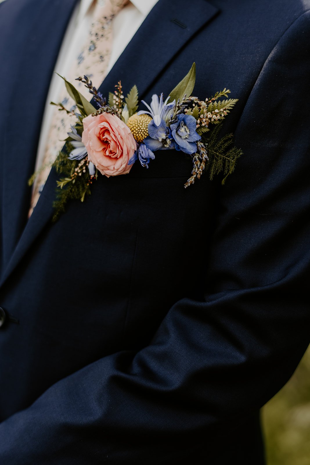 Pocket square boutonnieres have gotten more and more popular this wedding season, and we couldn't be more delighted.