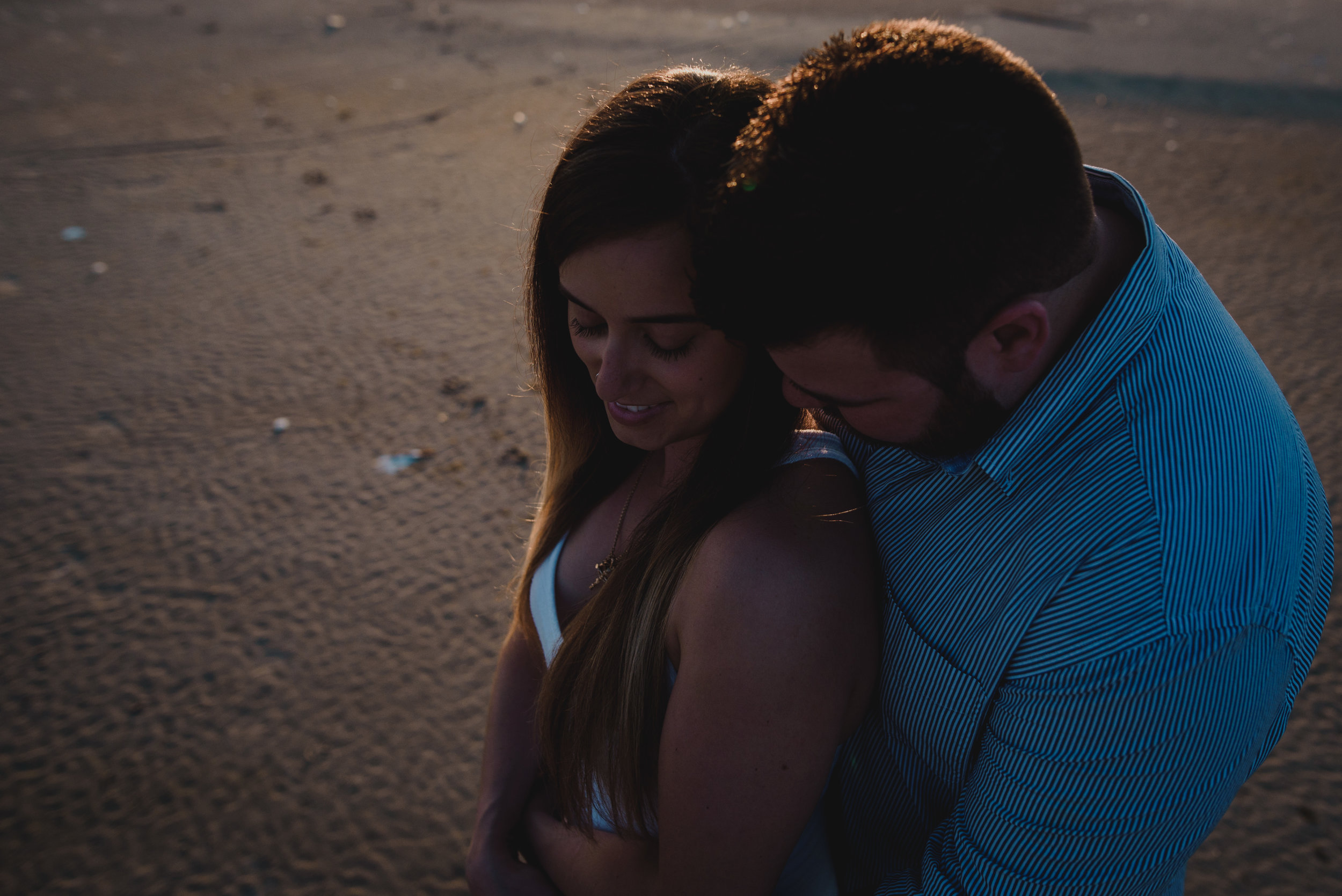 Victoria+Steven_Engaged_GrandBeach(C)-10.jpg