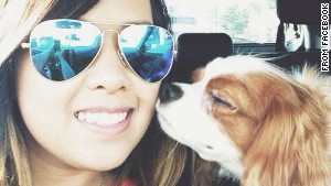 Nina Pham, Dallas nurse who was recently cleared of ebola, reunites with her dog. She describes the experience as "like Christmas morning." Source: CNN