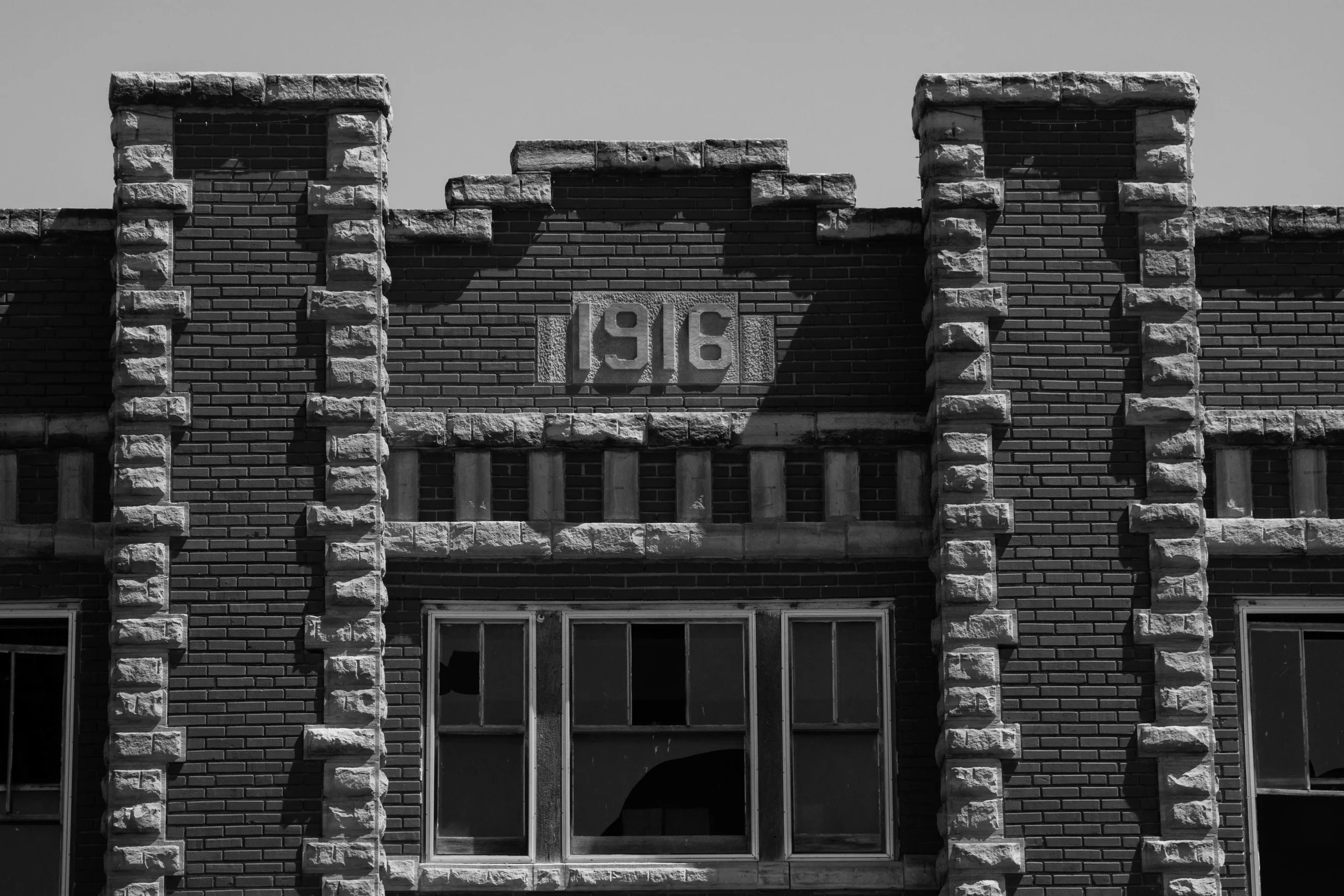 Some how I found myself in Rush County in the middle of no where. As i was driving down the highway I saw a grain elevator with the town Alexander around it. On the edge of this small town was a wonderful old high school built in 1916. There were some busted out windows and the inside was gutted, but the outside of the school was still in wonderful shape.