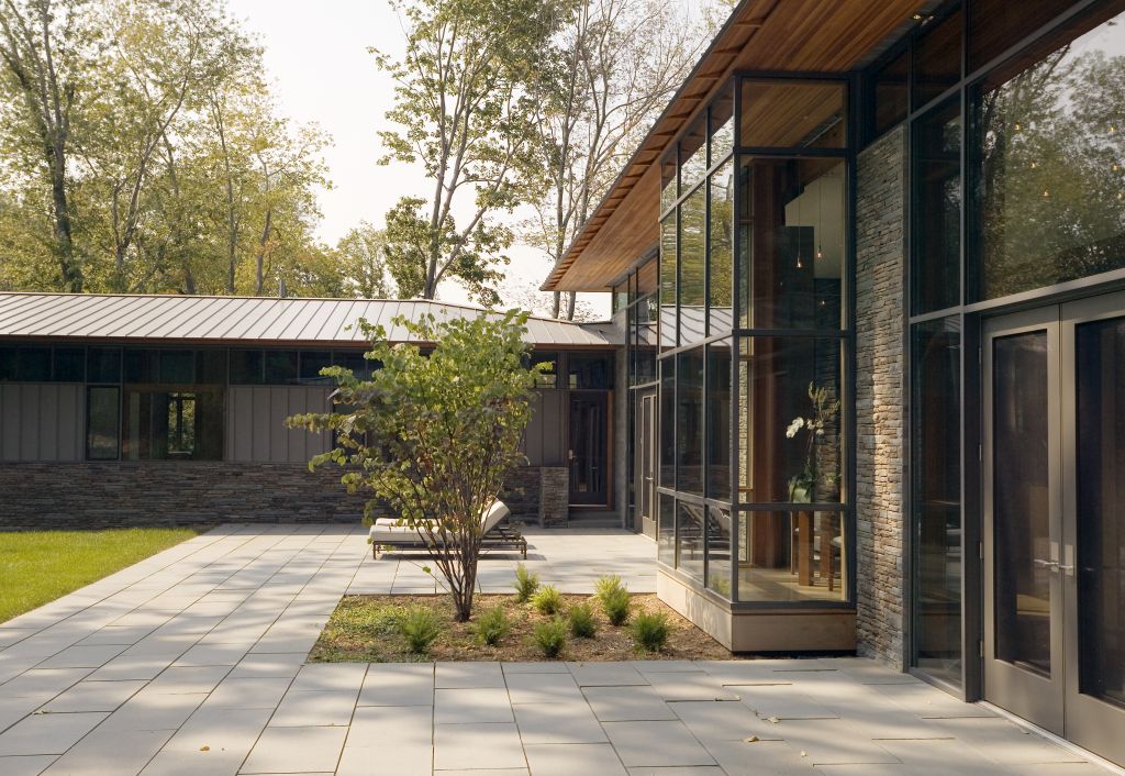 stone patio back yard glass walls