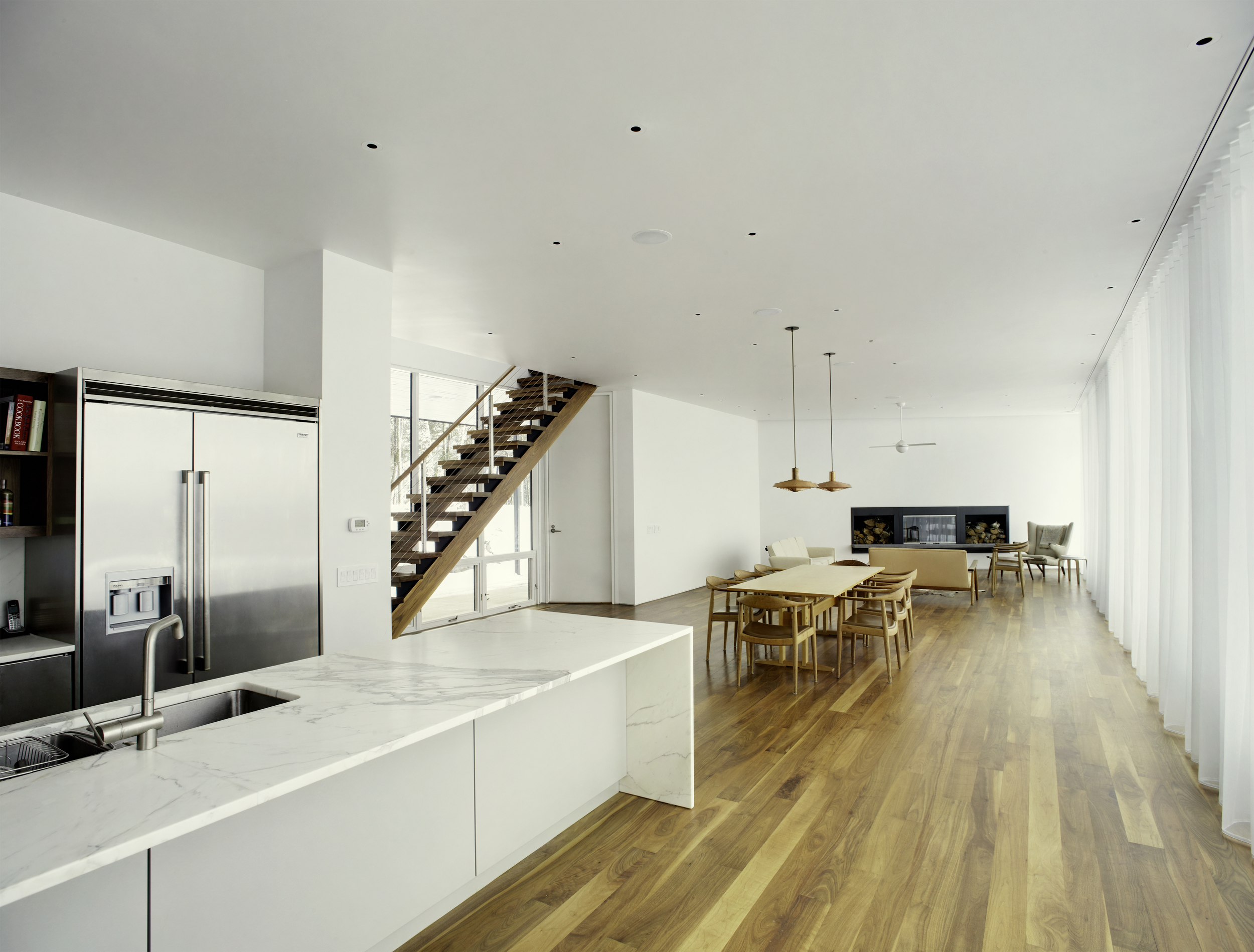 wood floors marble countertops stainless steel kitchen