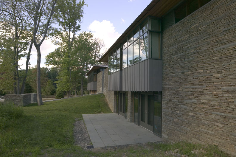 side yard modern craftsman style home stone work