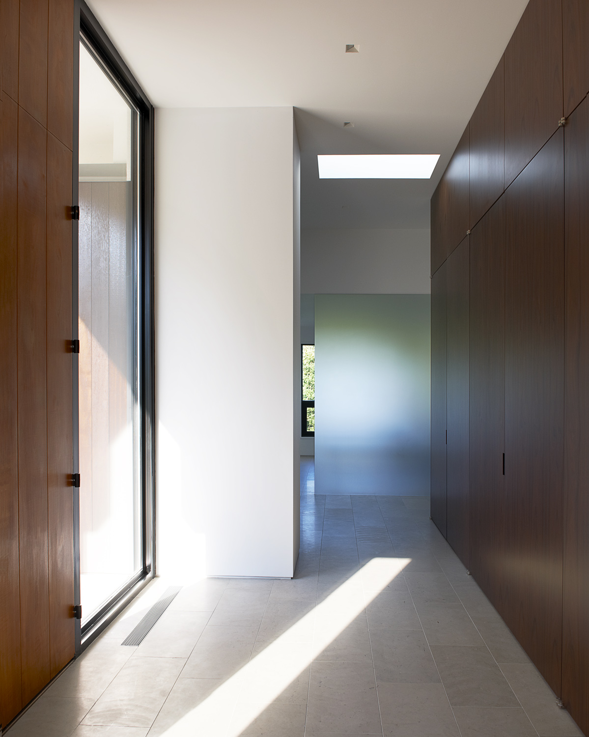 large wood doors hallway bright light