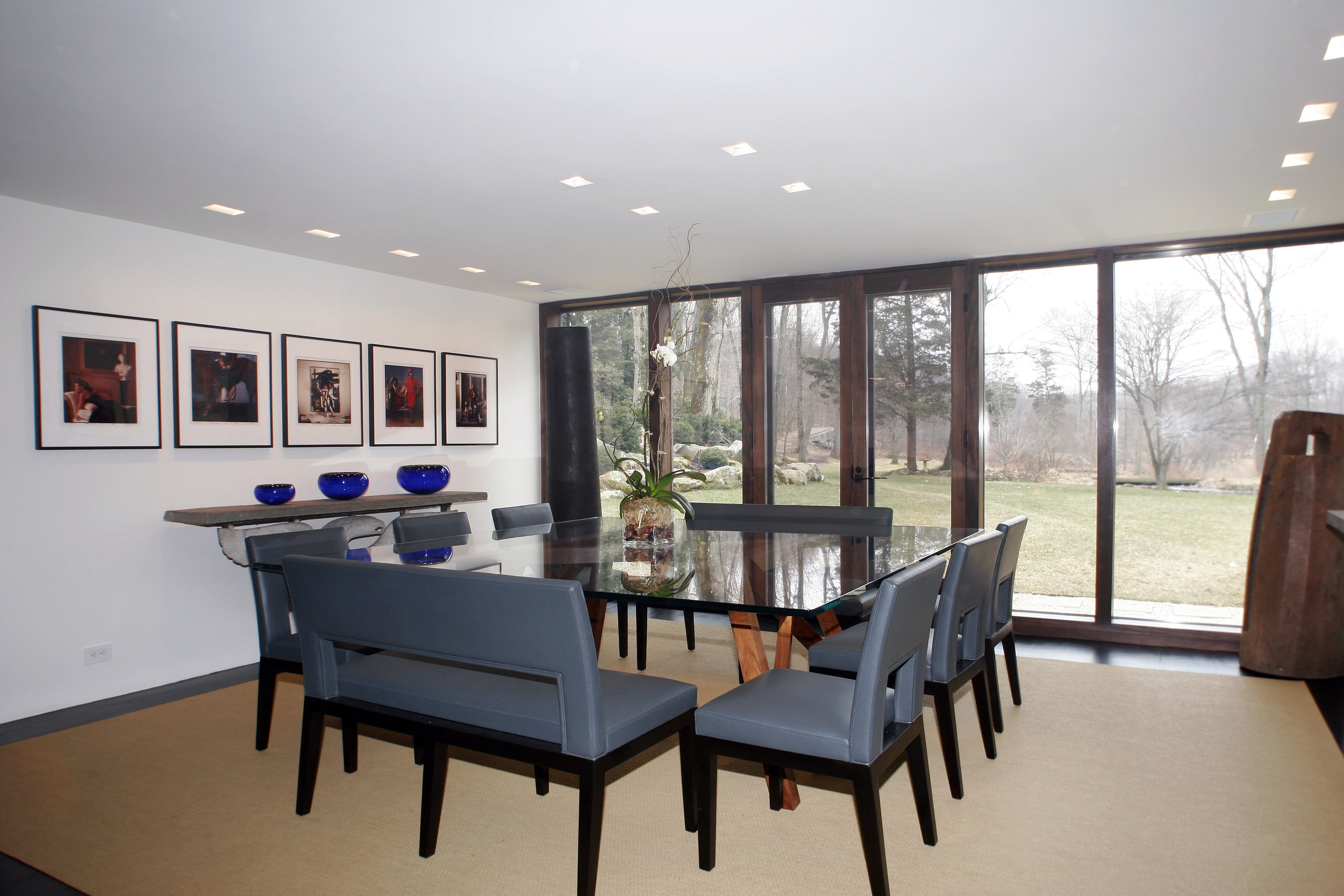 relaxing dining room full length glass windows door