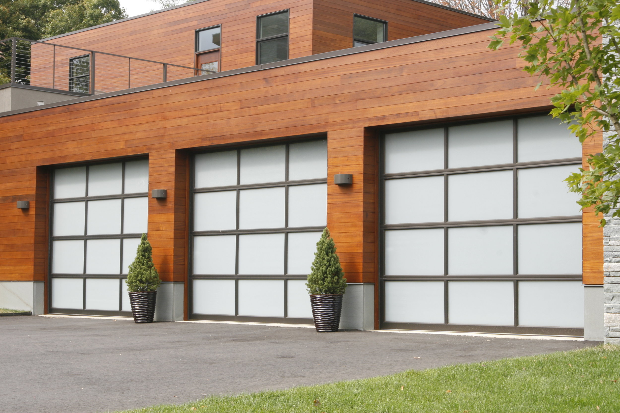 beautiful clean modern garage landscaping