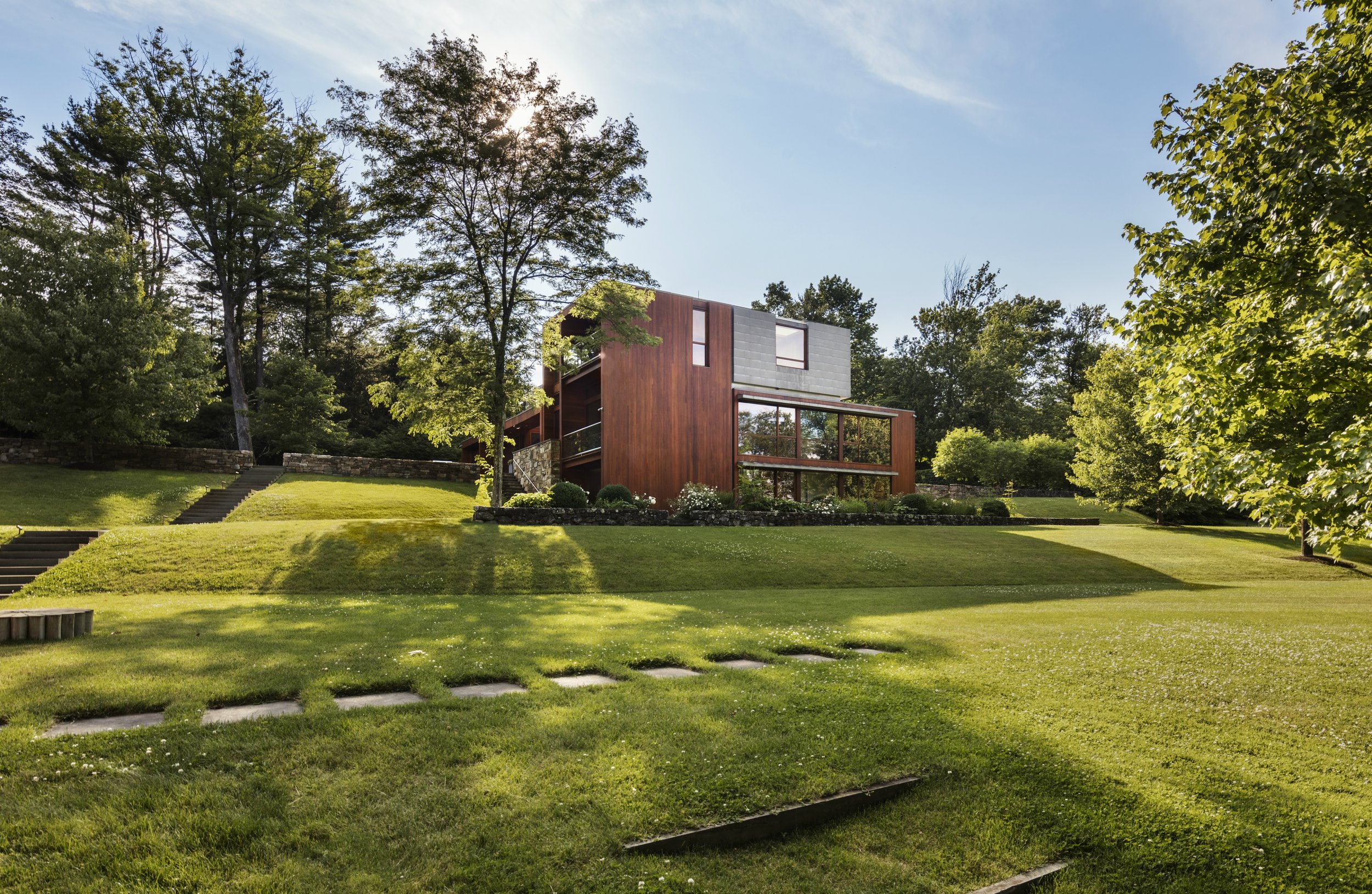 glass stone and wood unique modern house