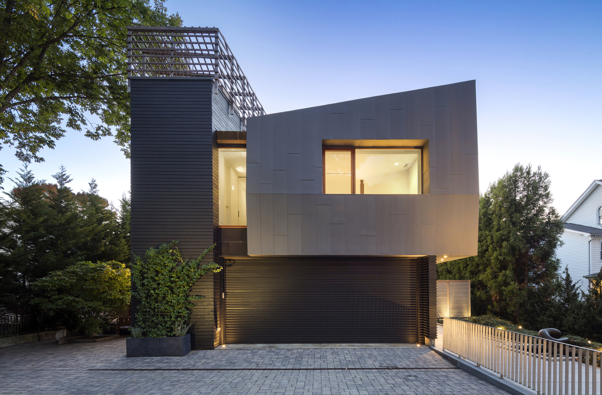 beautiful street view of new canaan townhouse modern architecture