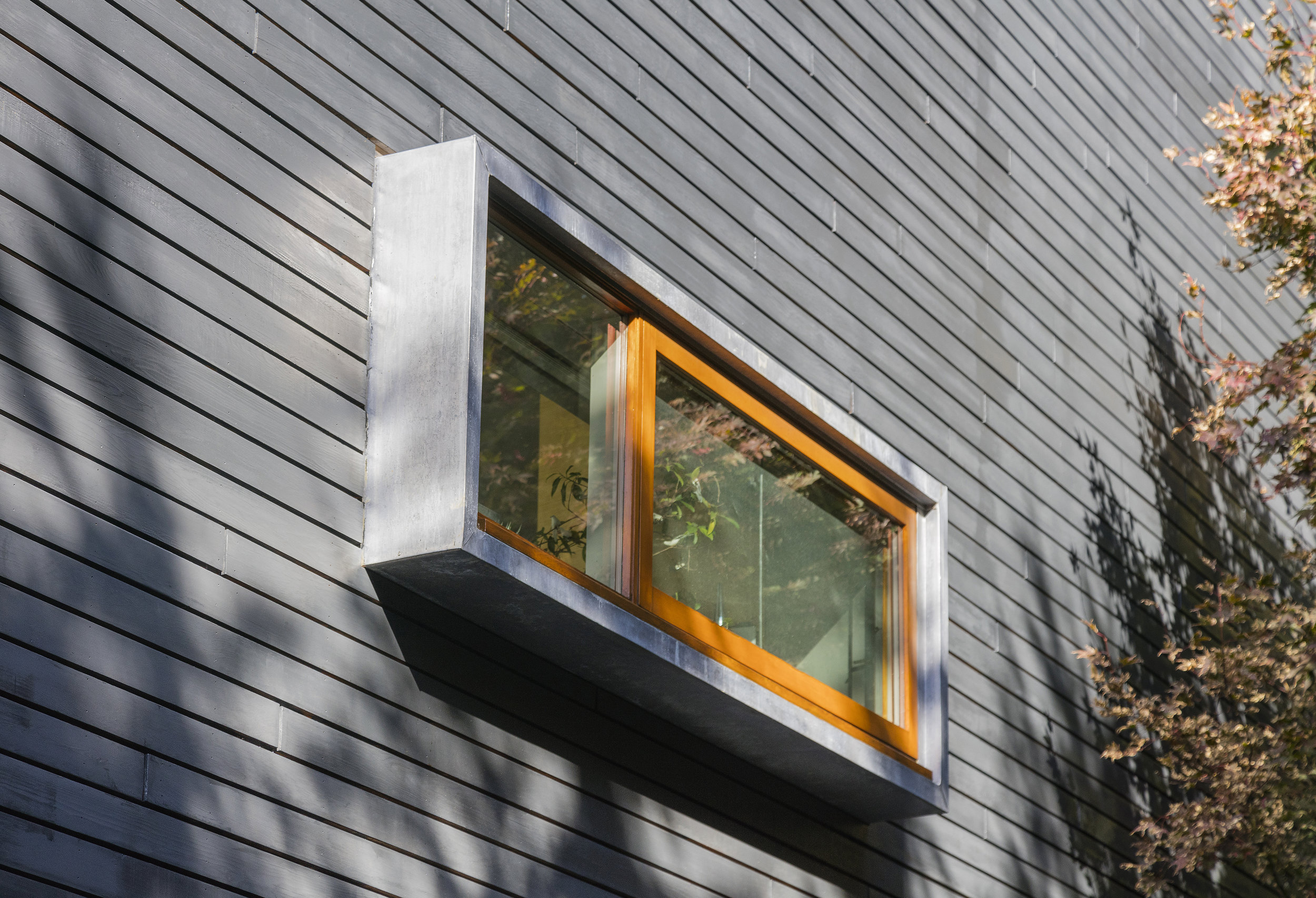extruded sliding window modern architecture design in fairfield county ct