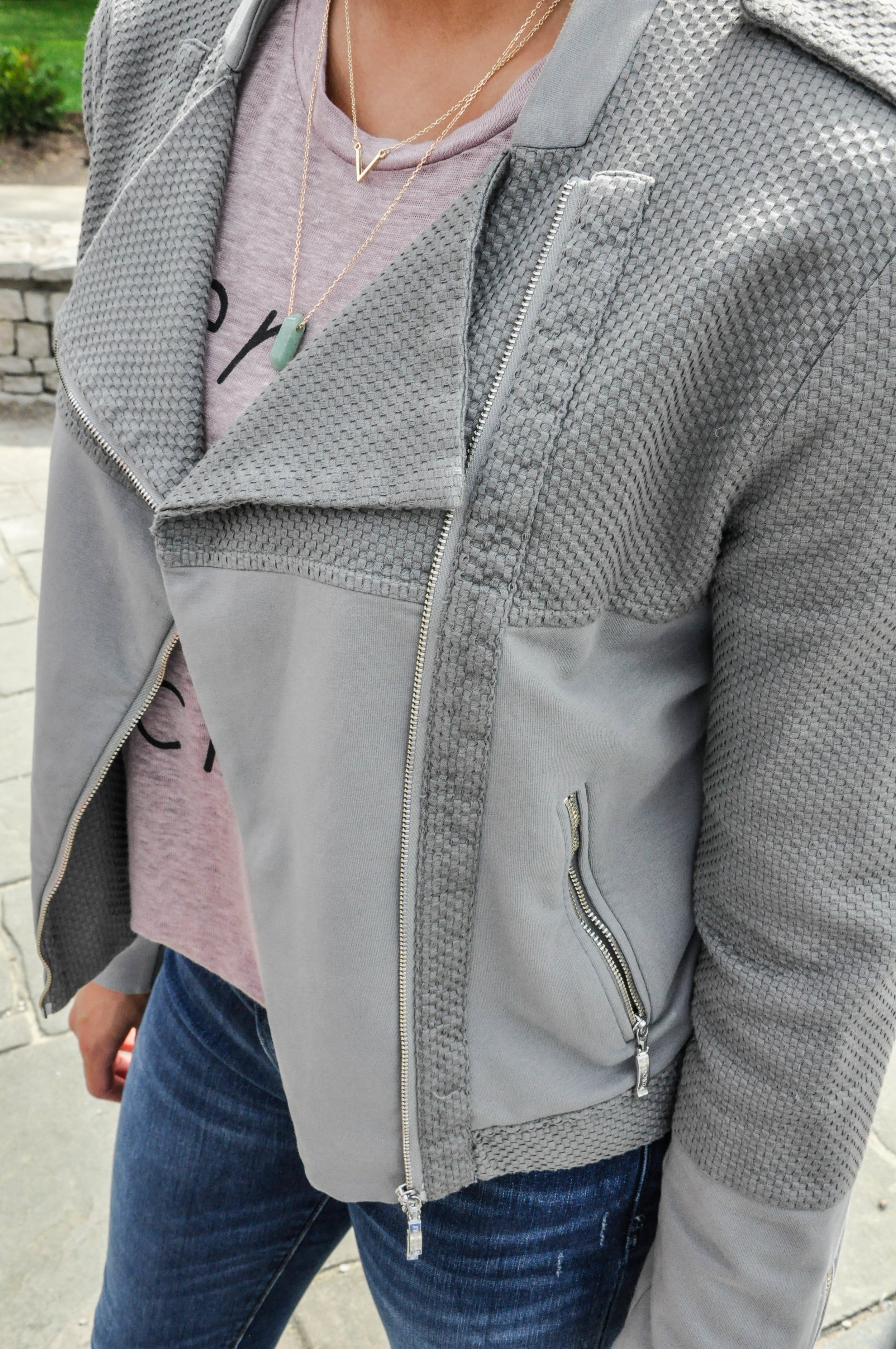 A few things that really drew me into this jacket are the faded olive green color as well as its unique texture. The woven detail on the sleeves and collar makes this jacket stand out from the usual asymmetrical zippered biker jacket not only in style, but also in texture. 